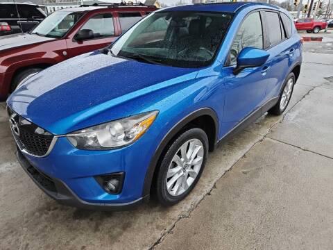 2013 Mazda CX-5 for sale at SpringField Select Autos in Springfield IL