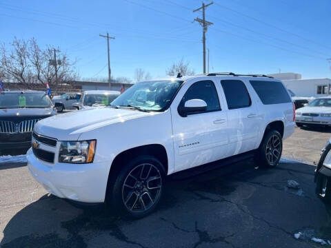 2013 Chevrolet Suburban for sale at Rivera Auto Sales LLC in Saint Paul MN