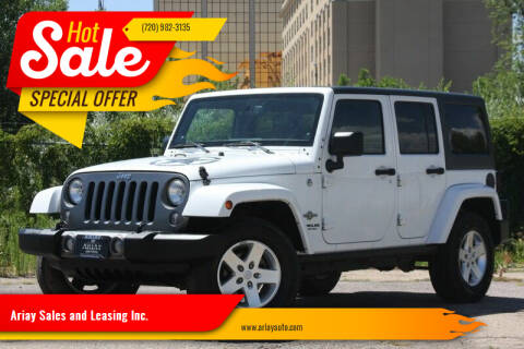 2014 Jeep Wrangler Unlimited for sale at Ariay Sales and Leasing Inc. - Pre Owned Storage Lot in Denver CO