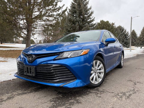 2019 Toyota Camry for sale at BELOW BOOK AUTO SALES in Idaho Falls ID