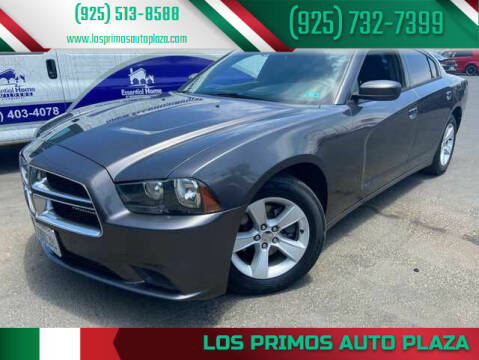 2014 Dodge Charger for sale at Los Primos Auto Plaza in Brentwood CA