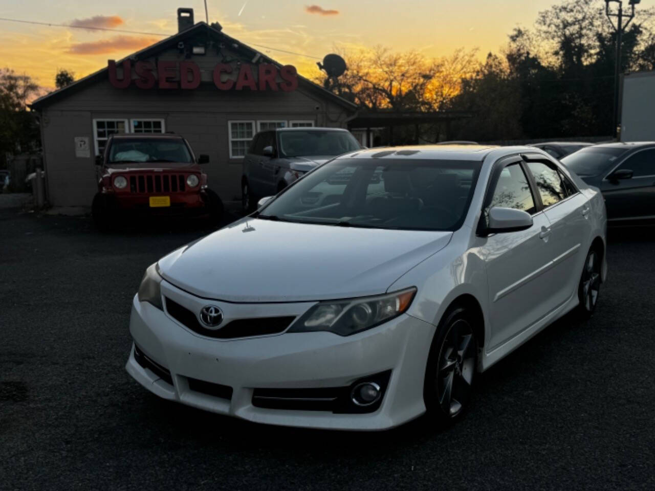 2014 Toyota Camry for sale at Walkem Autos in District Heights, MD