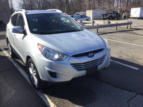 2011 Hyundai Tucson for sale at Desi's Used Cars in Peabody MA