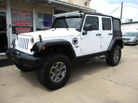 2013 Jeep Wrangler Unlimited for sale at Metroplex Motors Inc. in Houston TX