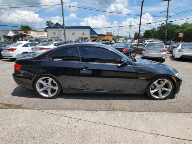 2011 BMW 3 Series for sale at DAGO'S AUTO SALES LLC in Dalton, GA