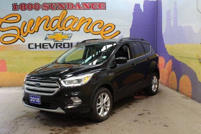 Used 2018 Ford Escape SEL with VIN 1FMCU9HD5JUA99871 for sale in Grand Ledge, MI