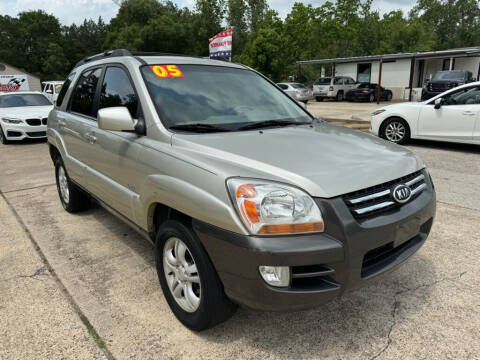 2005 Kia Sportage for sale at AUTO WOODLANDS in Magnolia TX