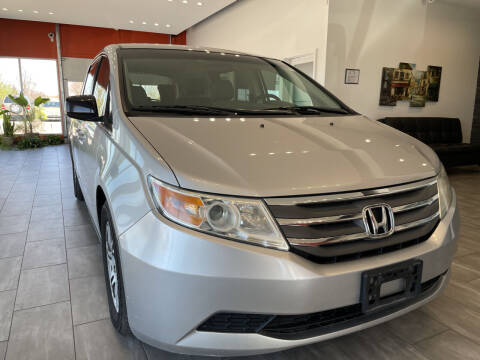 2012 Honda Odyssey for sale at Evolution Autos in Whiteland IN