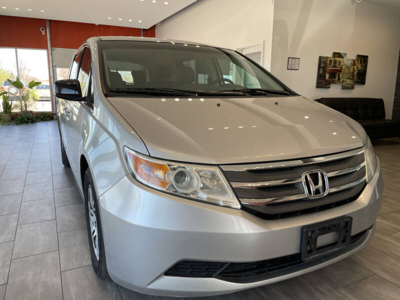 2012 Honda Odyssey for sale at Evolution Autos in Whiteland IN