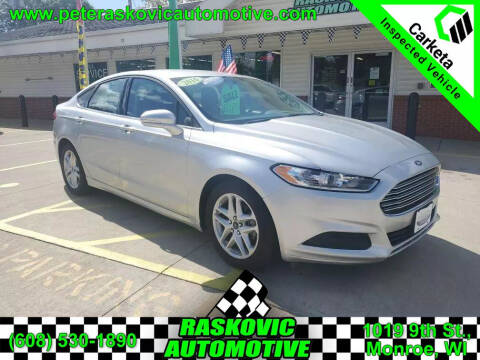 2016 Ford Fusion for sale at RASKOVIC AUTOMOTIVE GROUP in Monroe WI
