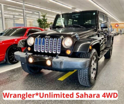 2016 Jeep Wrangler Unlimited for sale at Dixie Motors in Fairfield OH