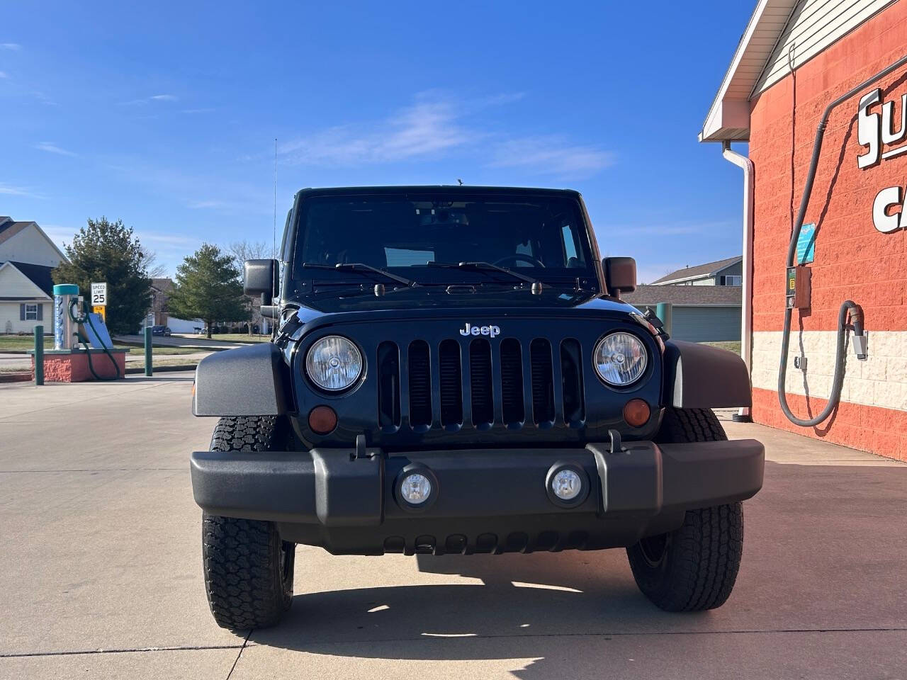 2014 Jeep Wrangler Unlimited for sale at Illinois Auto Wholesalers in Tolono, IL