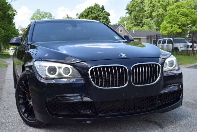 2014 BMW 7 Series for sale at QUEST AUTO GROUP LLC in Redford MI