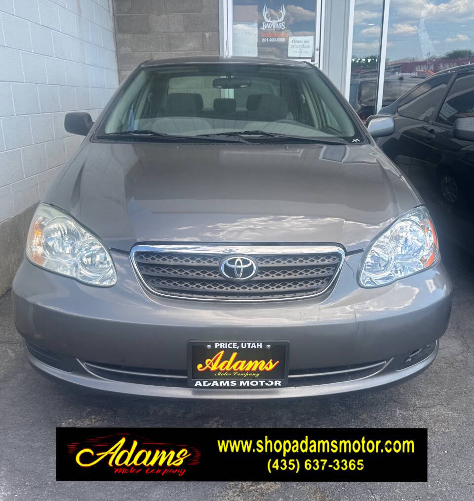 Gold 2005 Toyota Corolla LE LE 4dr Sedan 2