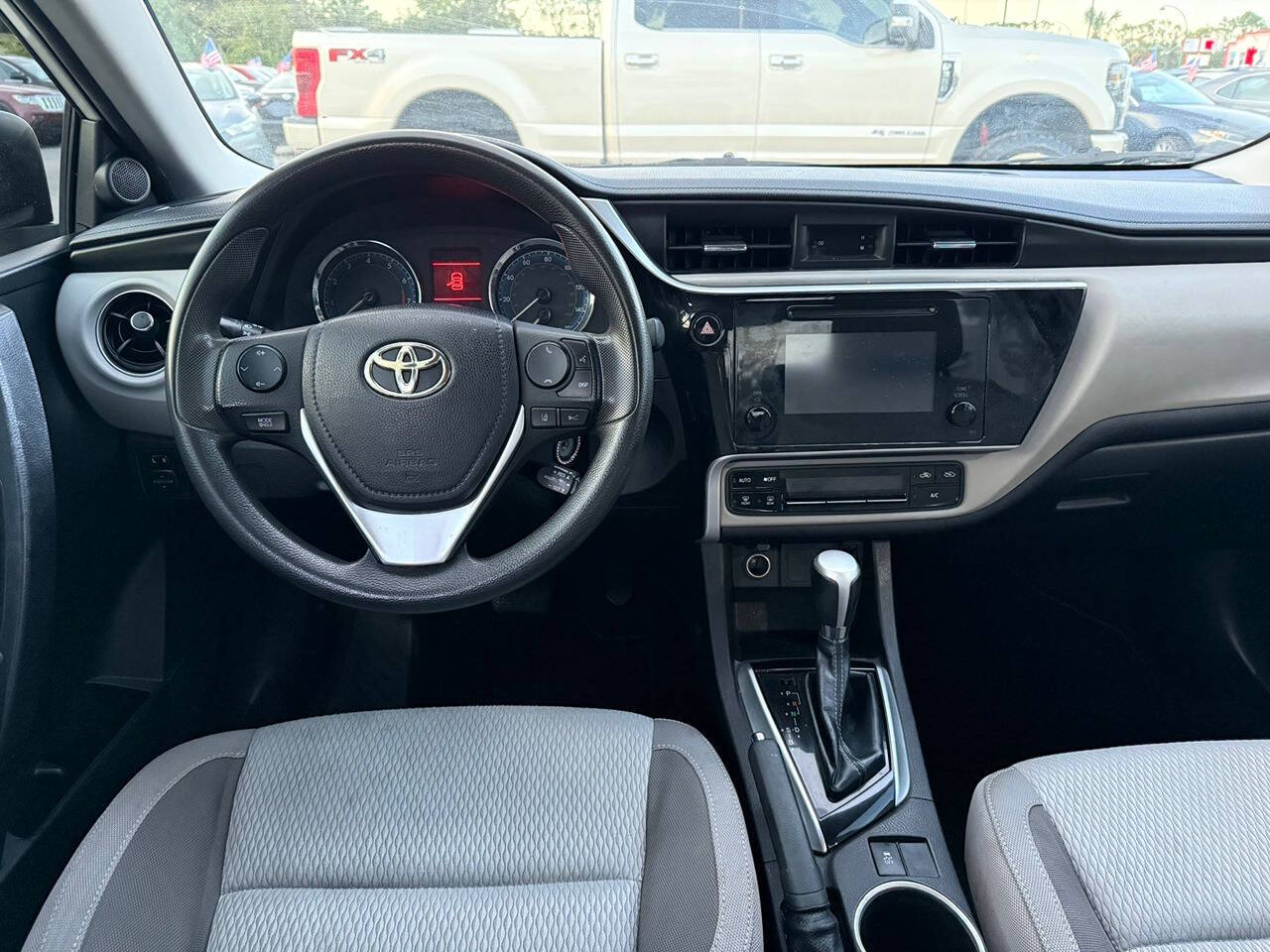 2018 Toyota Corolla for sale at DJA Autos Center in Orlando, FL