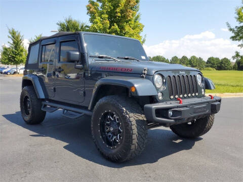 2017 Jeep Wrangler Unlimited for sale at Lou Sobh Kia in Cumming GA
