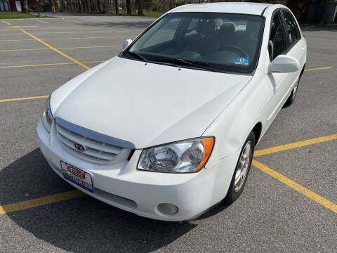 2005 Kia Spectra for sale at AMERI-CAR & TRUCK SALES INC in Haskell NJ