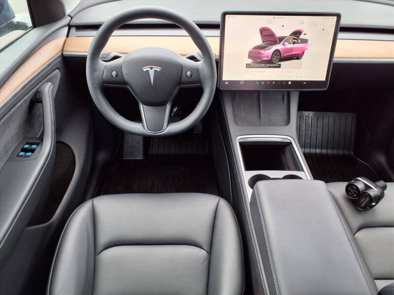 Used 2025 Tesla Model Y Long Range with VIN 7SAYGDEE2SA348669 for sale in Wood River, IL