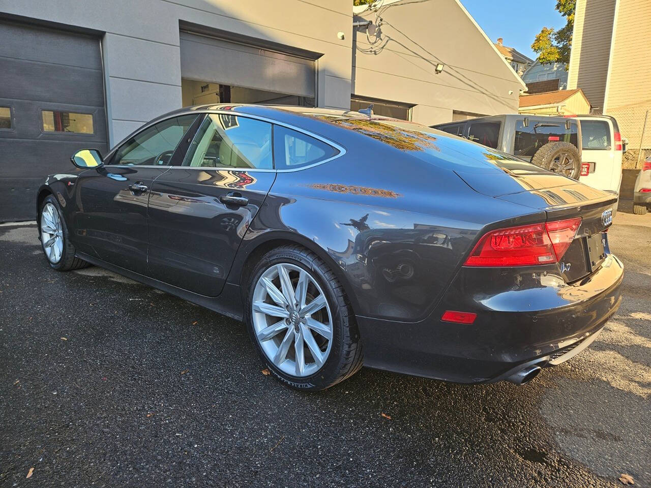 2014 Audi A7 for sale at RENOS AUTO SALES LLC in Waterbury, CT