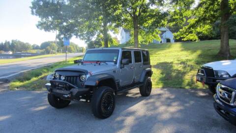 2013 Jeep Wrangler Unlimited for sale at Auto Outlet of Morgantown in Morgantown WV