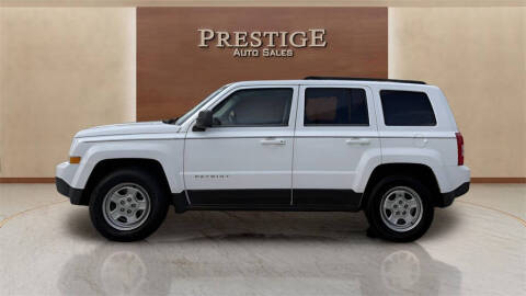 2014 Jeep Patriot for sale at CHRIS SPEARS' PRESTIGE AUTO SALES INC in Ocala FL