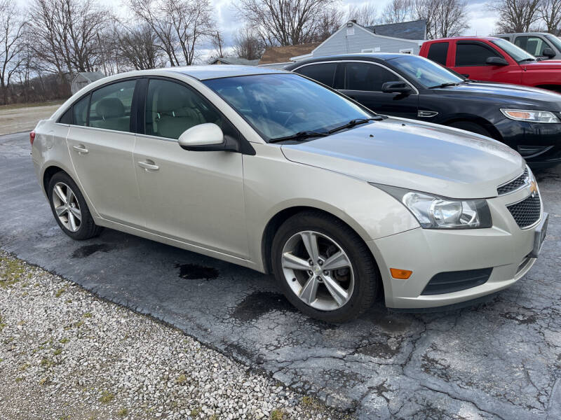 2013 Chevrolet Cruze for sale at HEDGES USED CARS in Carleton MI