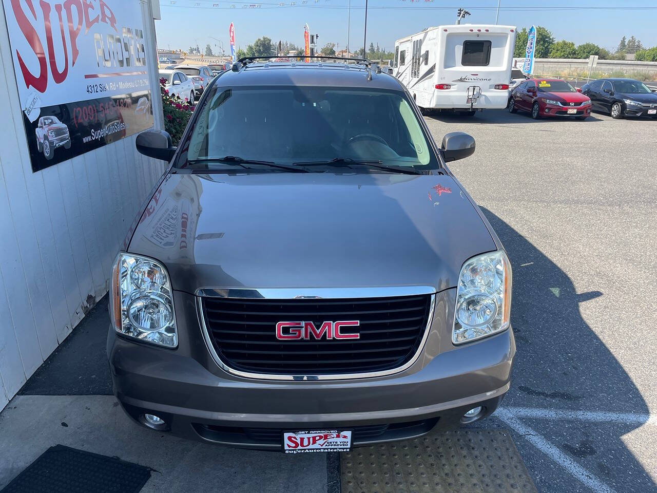 2014 GMC Yukon for sale at Super Auto Sales Modesto in Modesto, CA