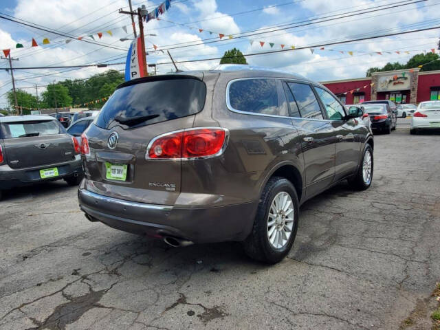 2009 Buick Enclave for sale at DAGO'S AUTO SALES LLC in Dalton, GA