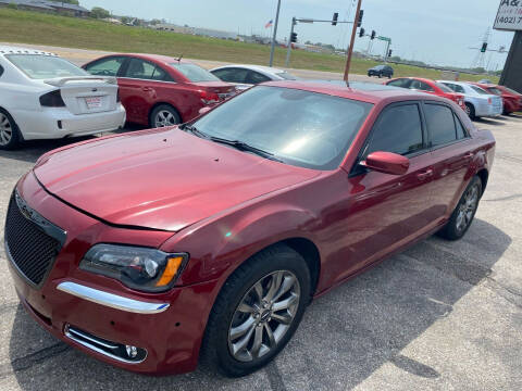 2014 Chrysler 300 for sale at A & R AUTO SALES in Lincoln NE