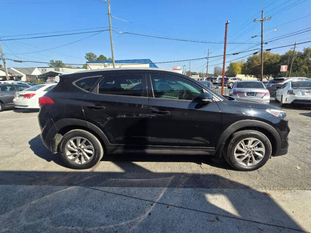 2016 Hyundai TUCSON for sale at DAGO'S AUTO SALES LLC in Dalton, GA