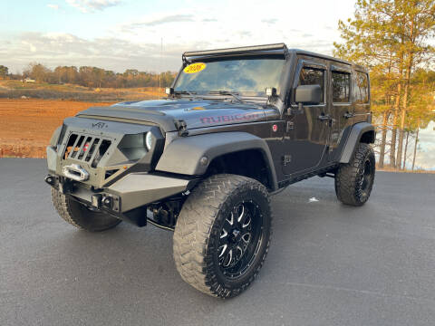 2016 Jeep Wrangler Unlimited for sale at BILL HANCOCK MOTORS LLC in Albertville AL