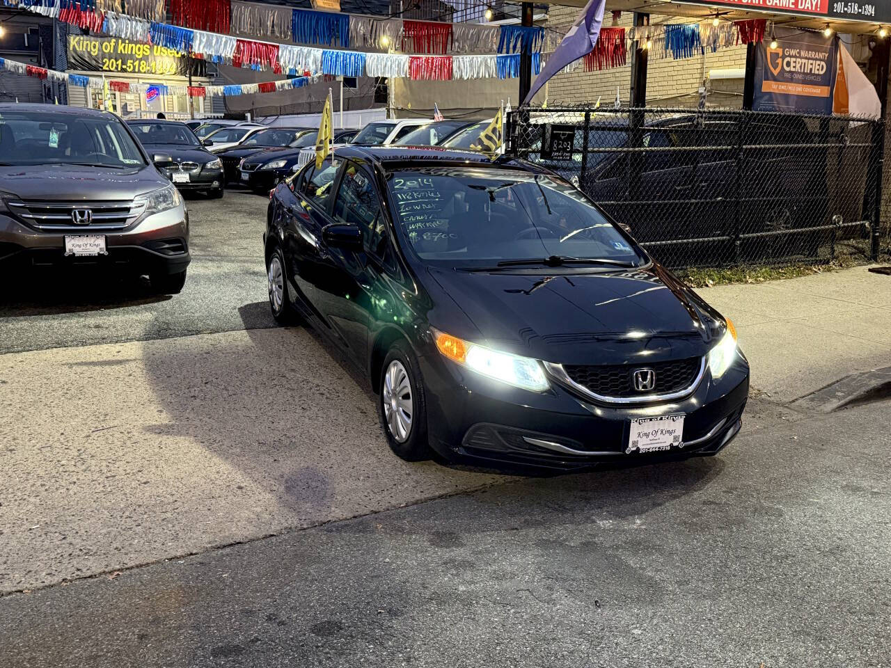 2014 Honda Civic LX 4dr Sedan CVT - Black exterior view 5