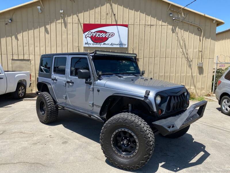 2013 Jeep Wrangler Unlimited for sale at Approved Autos in Bakersfield CA