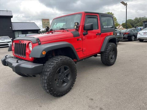 2016 Jeep Wrangler for sale at HUFF AUTO GROUP in Jackson MI