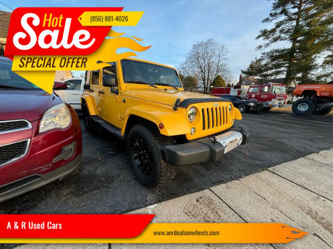 2015 Jeep Wrangler Unlimited for sale at A & R Used Cars in Clayton NJ