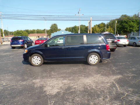 2014 Dodge Grand Caravan for sale at R V Used Cars LLC in Georgetown OH