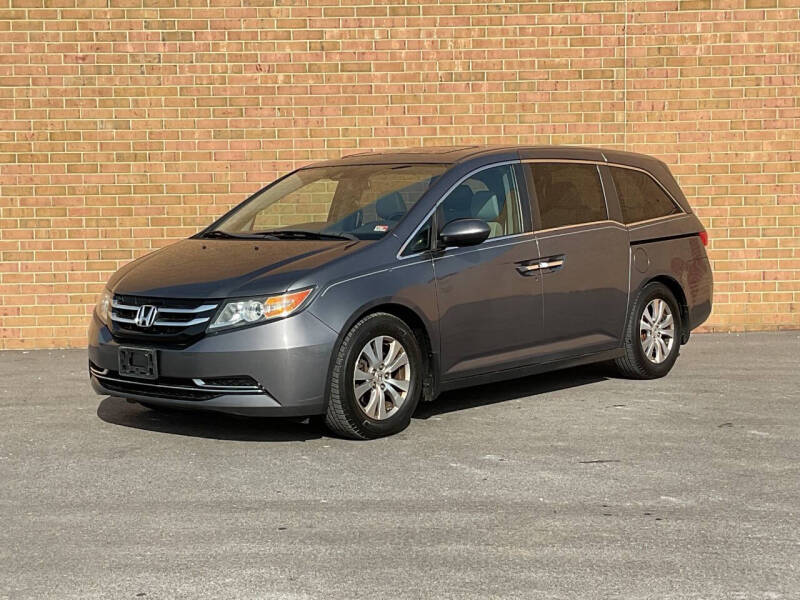 2014 Honda Odyssey for sale at AMERICAR INC in Laurel MD