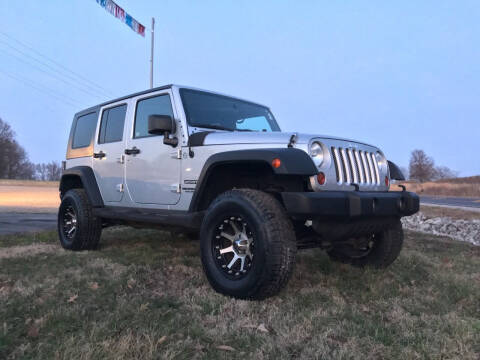 2011 Jeep Wrangler Unlimited for sale at Ridgeway's Auto Sales in West Frankfort IL