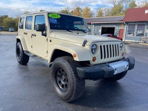 2011 Jeep Wrangler Unlimited for sale at Newcombs Auto Sales in Auburn Hills MI