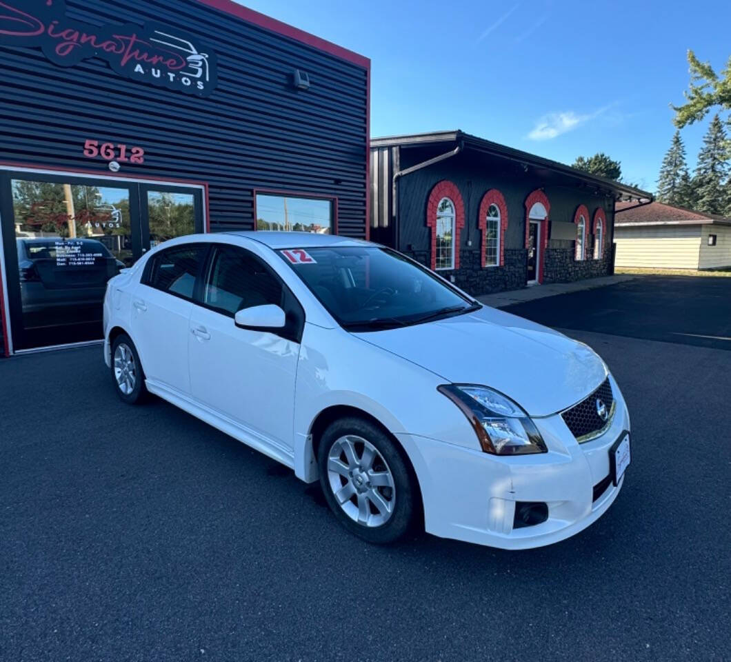 2012 Nissan Sentra for sale at SIGNATURE AUTOS LLC in Weston, WI