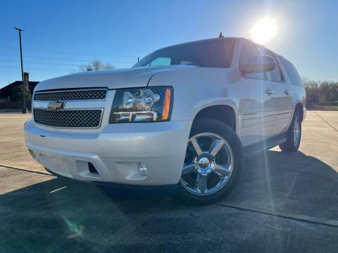 2013 Chevrolet Suburban for sale at AUTO DIRECT Bellaire in Houston TX
