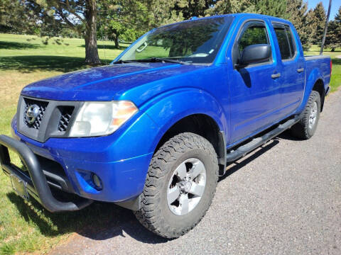 2013 Nissan Frontier for sale at BELOW BOOK AUTO SALES in Idaho Falls ID