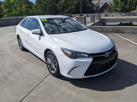 2015 Toyota Camry for sale at QC Motors in Fayetteville AR
