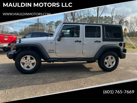 2012 Jeep Wrangler Unlimited for sale at MAULDIN MOTORS LLC in Sumrall MS