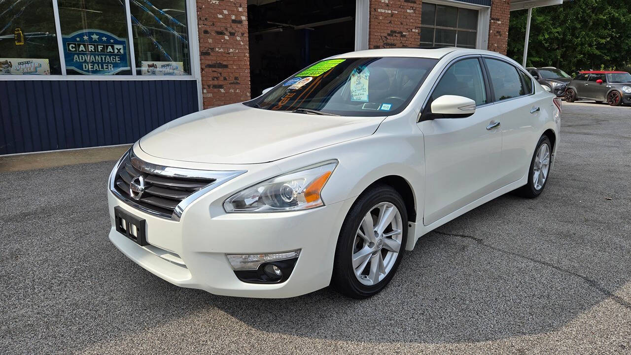 2013 Nissan Altima for sale at North Ridge Auto Center LLC in Madison, OH