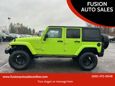 2013 Jeep Wrangler Unlimited for sale at FUSION AUTO SALES in Spencerport NY