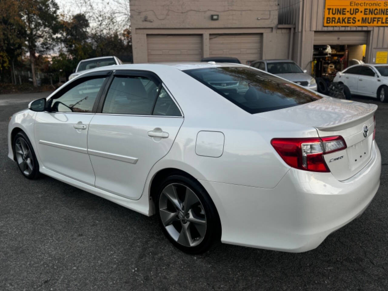 2014 Toyota Camry for sale at Walkem Autos in District Heights, MD