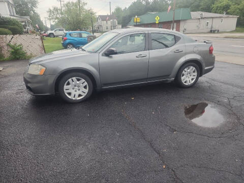 2012 Dodge Avenger for sale at Maximum Auto Group II INC in Cortland OH