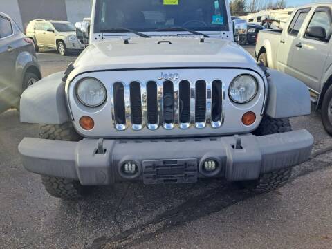 2011 Jeep Wrangler Unlimited for sale at Newport Auto Group in Boardman OH