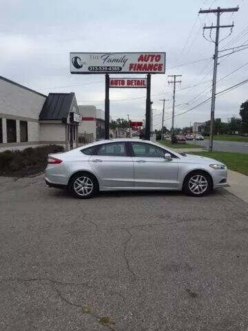 2015 Ford Fusion for sale at The Family Auto Finance in Redford MI